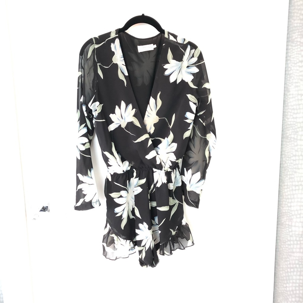 Lioness floral romper size small